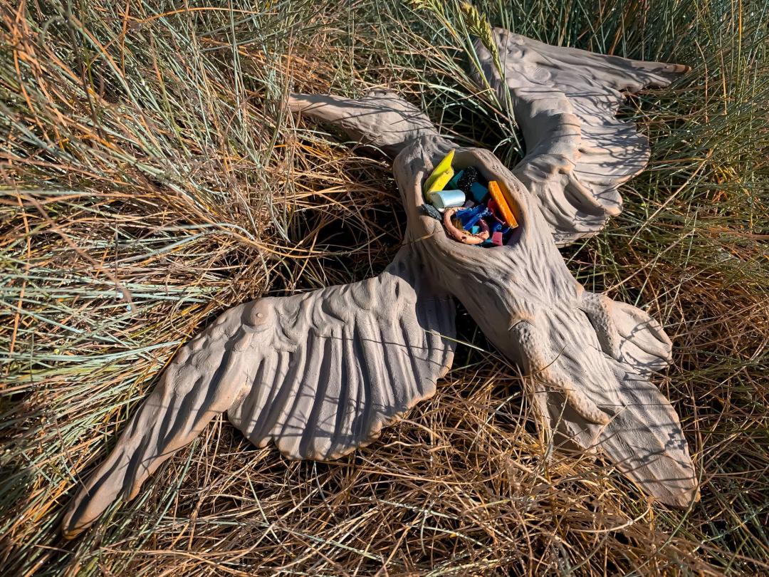 Bird sculpture modeling the plastics that is ingested by wildlife