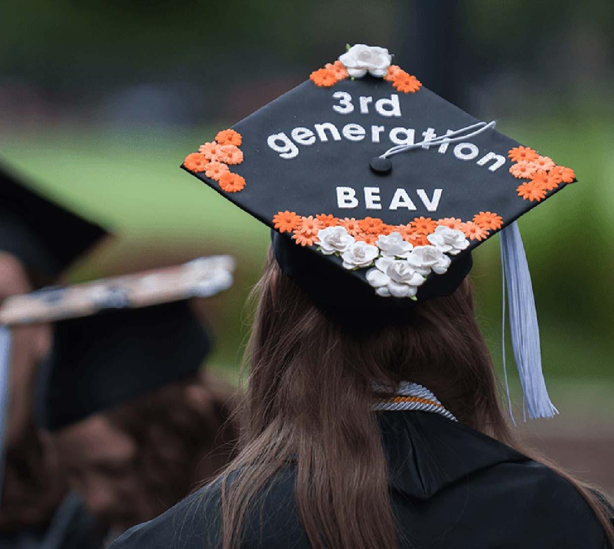 decorated graduation cap with "3rd Generation Beav" collaged on