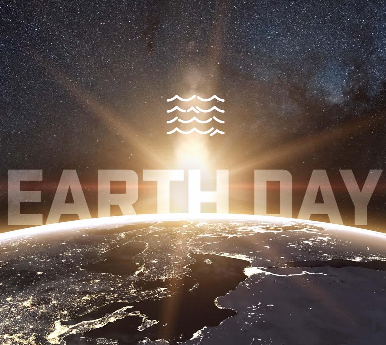 "Earth Day" written over image of Earth at night