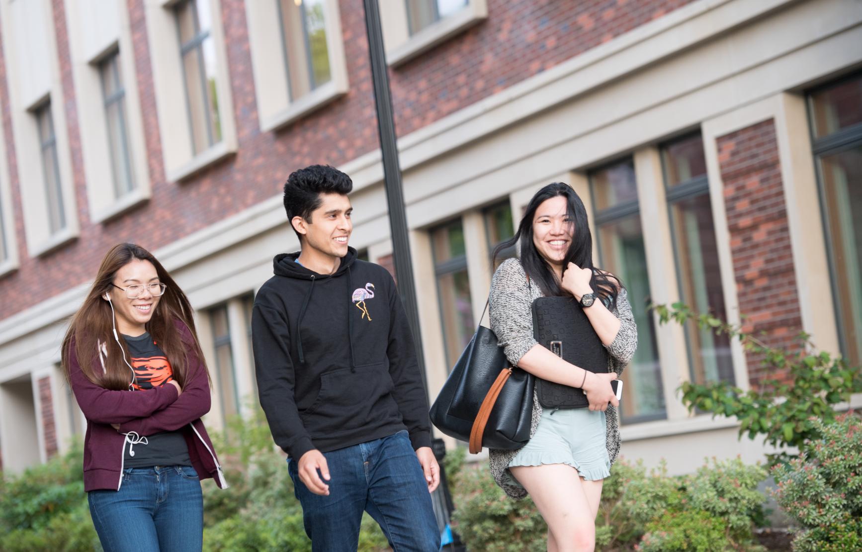 Three OSU students walking through the quad