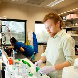 Colin Johnson working with samples in lab