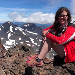 Audrey Dickinson on a mountain top