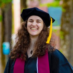 Abbie Glickman wearing graduation cap