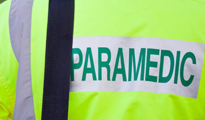 back of neon green paramedic coat