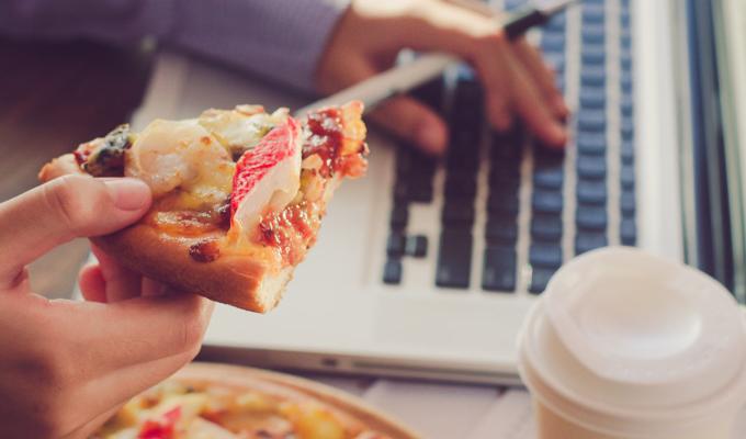 Working on homework with pizza and coffee