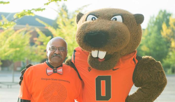 Dean Pantula with Benny the Beaver outide Reser