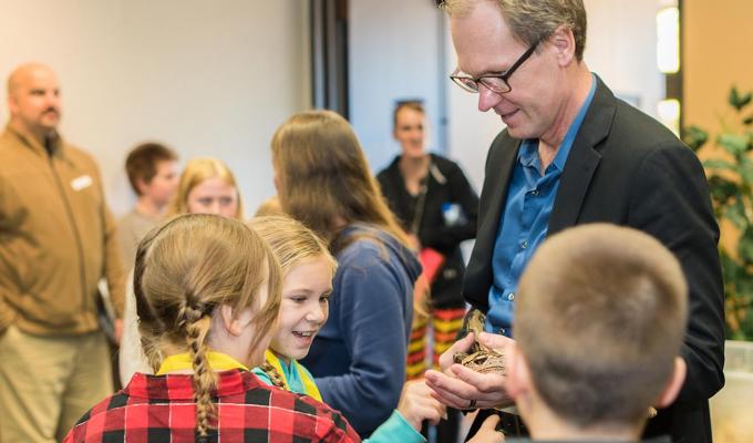 Roy Haggerty showing children a snake