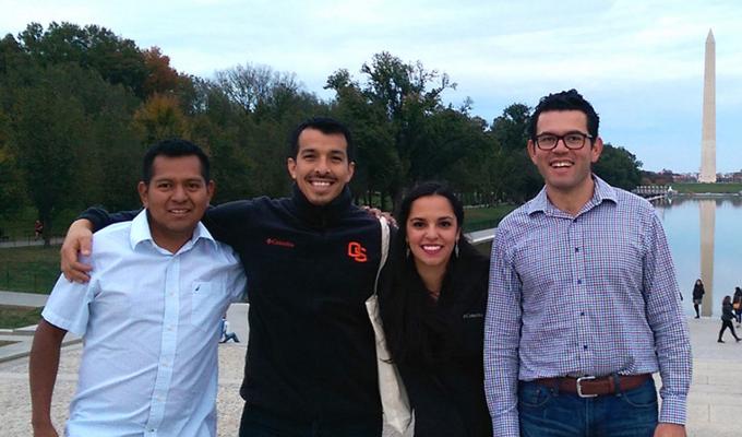 Group photo of representatives in front of Washington DC viewpoint