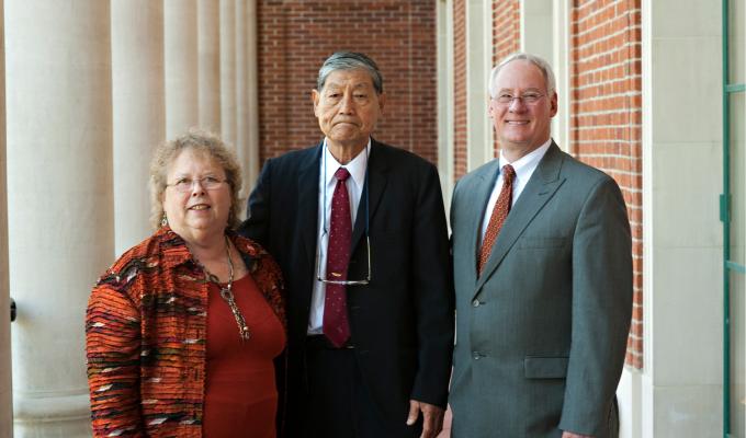 Dr. Samuel Wang with OSU's previous president Ed Ray and his wife, Beth Ray standing together along the Memorial Union Java Stop balcony.