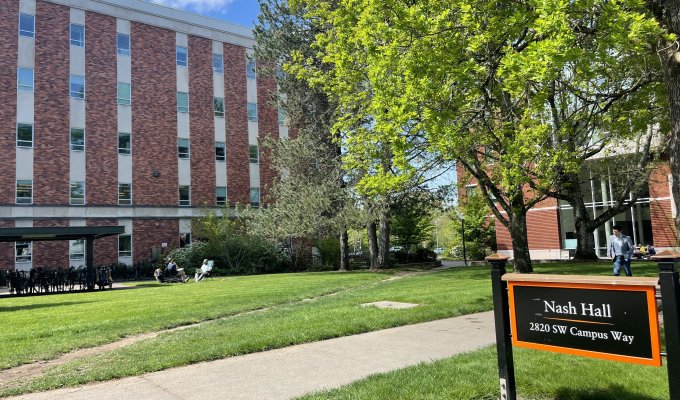 Image of a brick building with a sign that says Nash Hall.