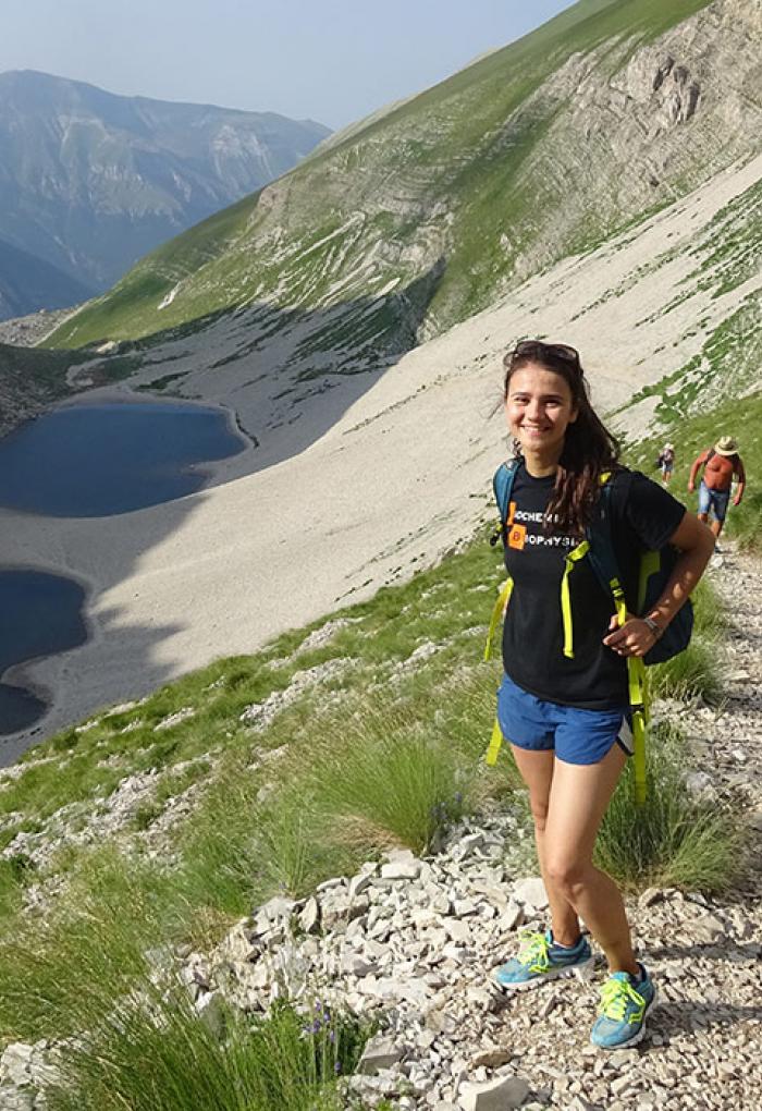 Arianna Kahler-Quesada hiking on hillside