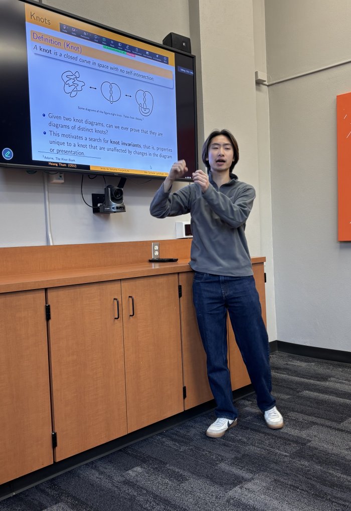 Hsiang Thum is a Mathematics student and here presents a theoretical discussion on the volume conjecture of knots.
