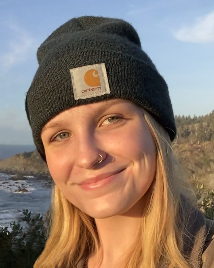 headshot of Nicole Miller at the coast