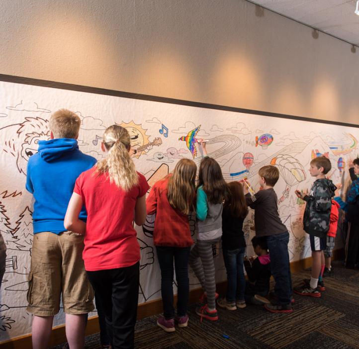 children coloring Crayola paper banner of crayon cartoons hiking