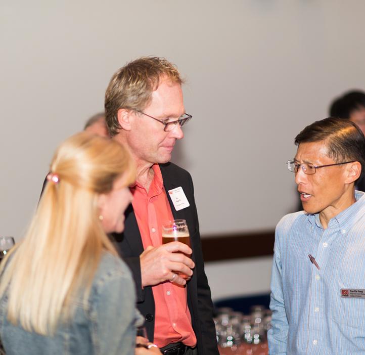 College of Science Dean Roy Haggerty (left) in conversation with Projects & Events Manager Tze-Yiu Yong