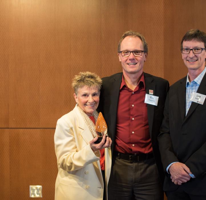 Distinguished Service Award recipients Kay Merrill and Lee Sickler with Dean Roy Haggerty (center)