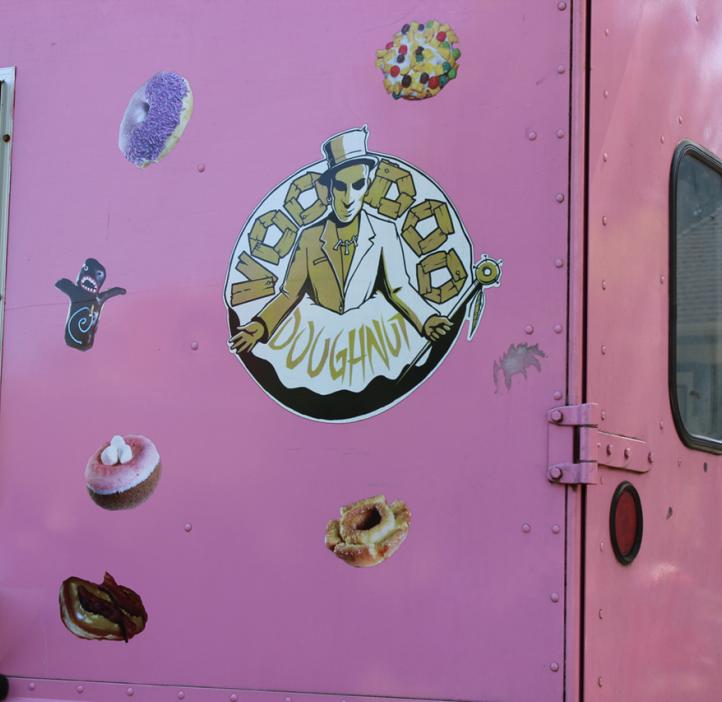 Voodoo Doughnut logo on back of pink truck