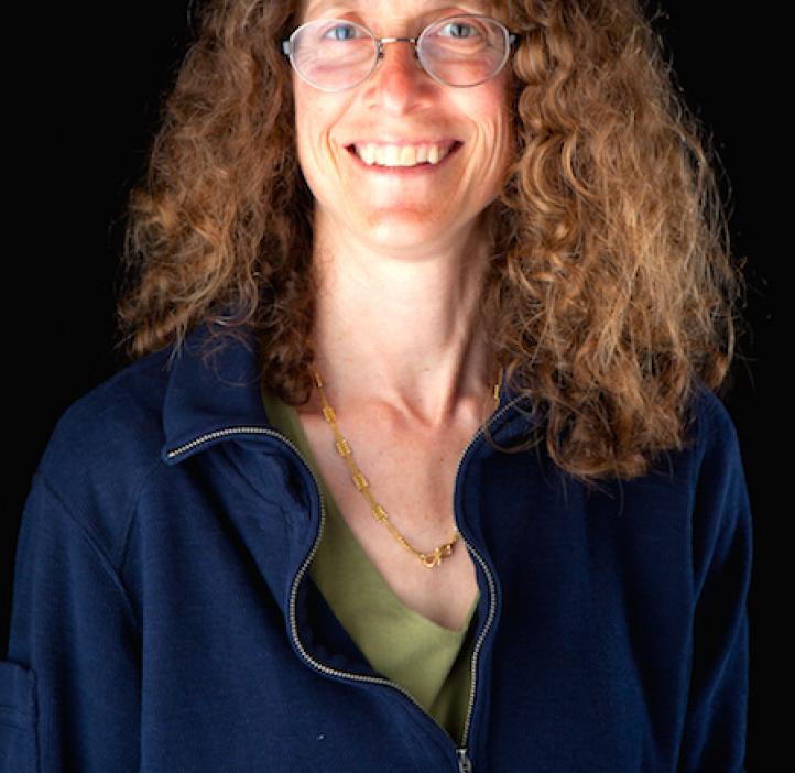 May Nyman, Chemistry professor in front of black backdrop