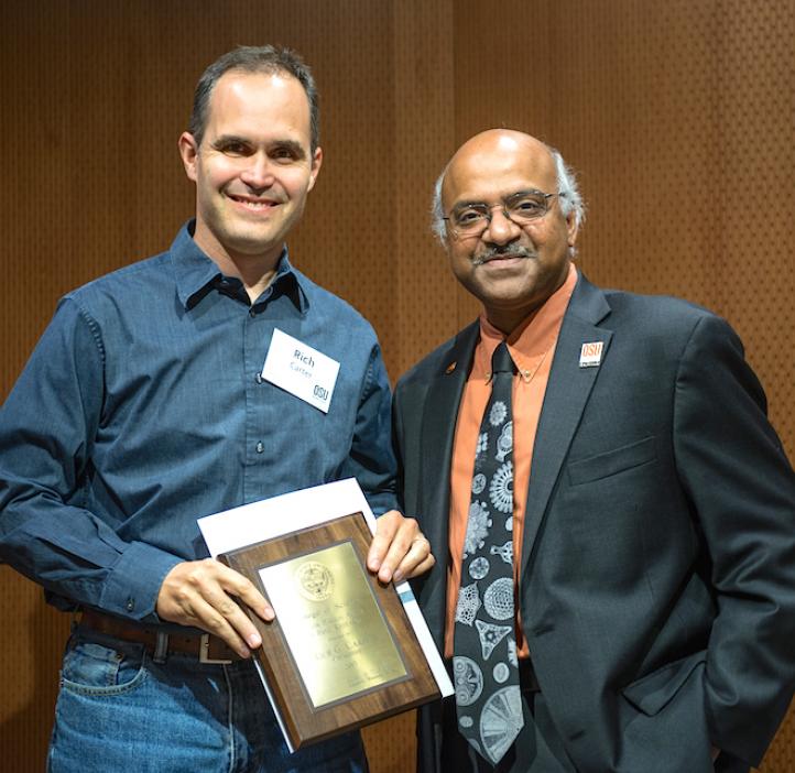 Chemistry Department Chair Rich Carter receives the Milton Harris in Basic Research