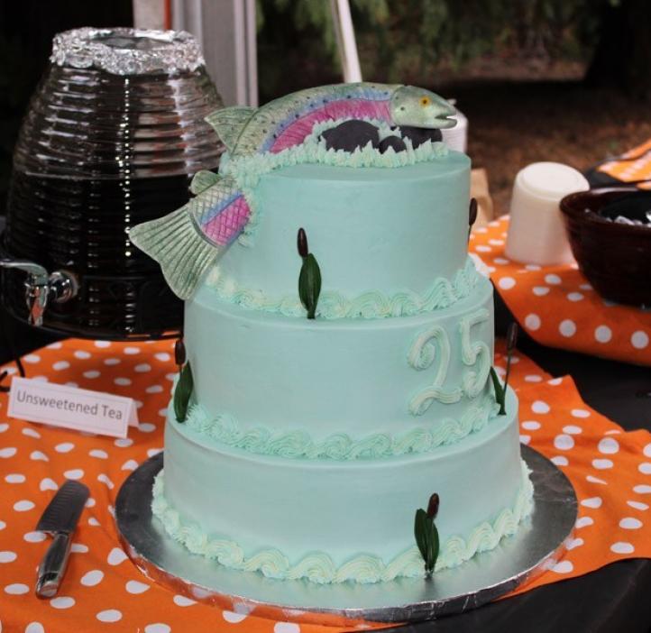three tier cake decorated with salmon