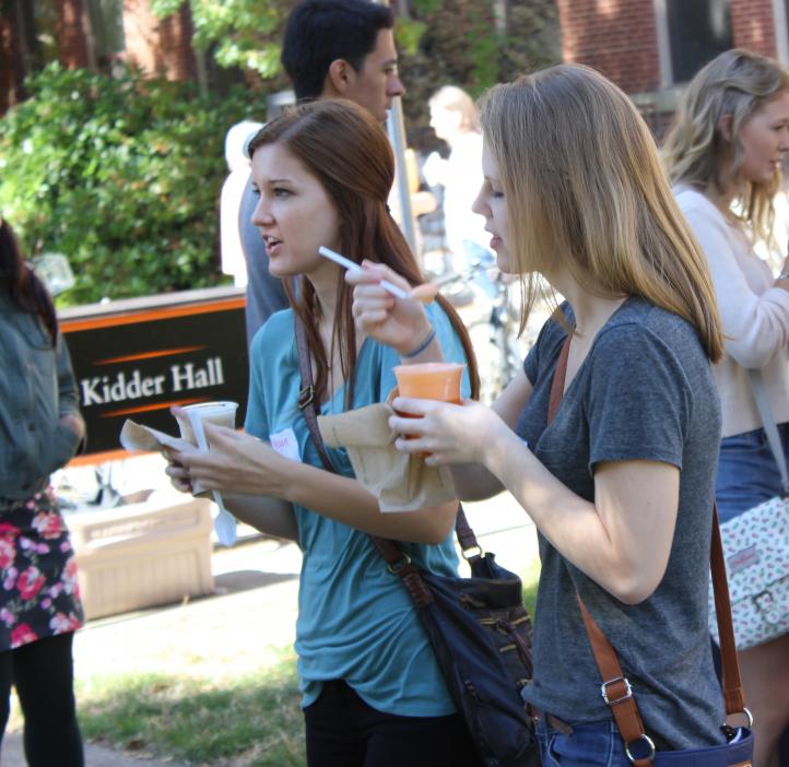 two female science students enjoying ice cream floats
