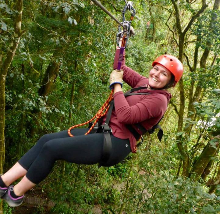 Katrina Ann Hiebel zip lining down forest