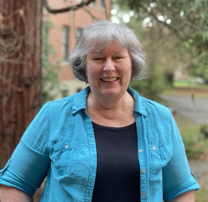 Headshot of Margie Haak in blue top.
